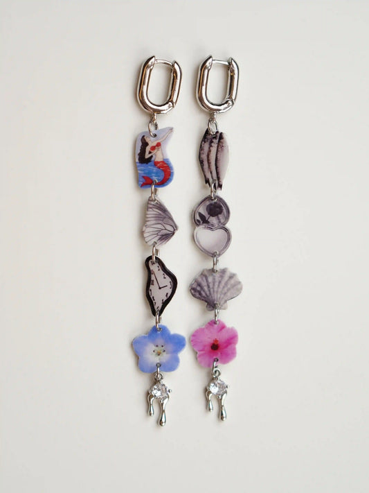 Ocean Earrings — Mismatched Graphic Charm Earrings with retro mermaid and Dalí clock, handcrafted resin composite by HERIZONE