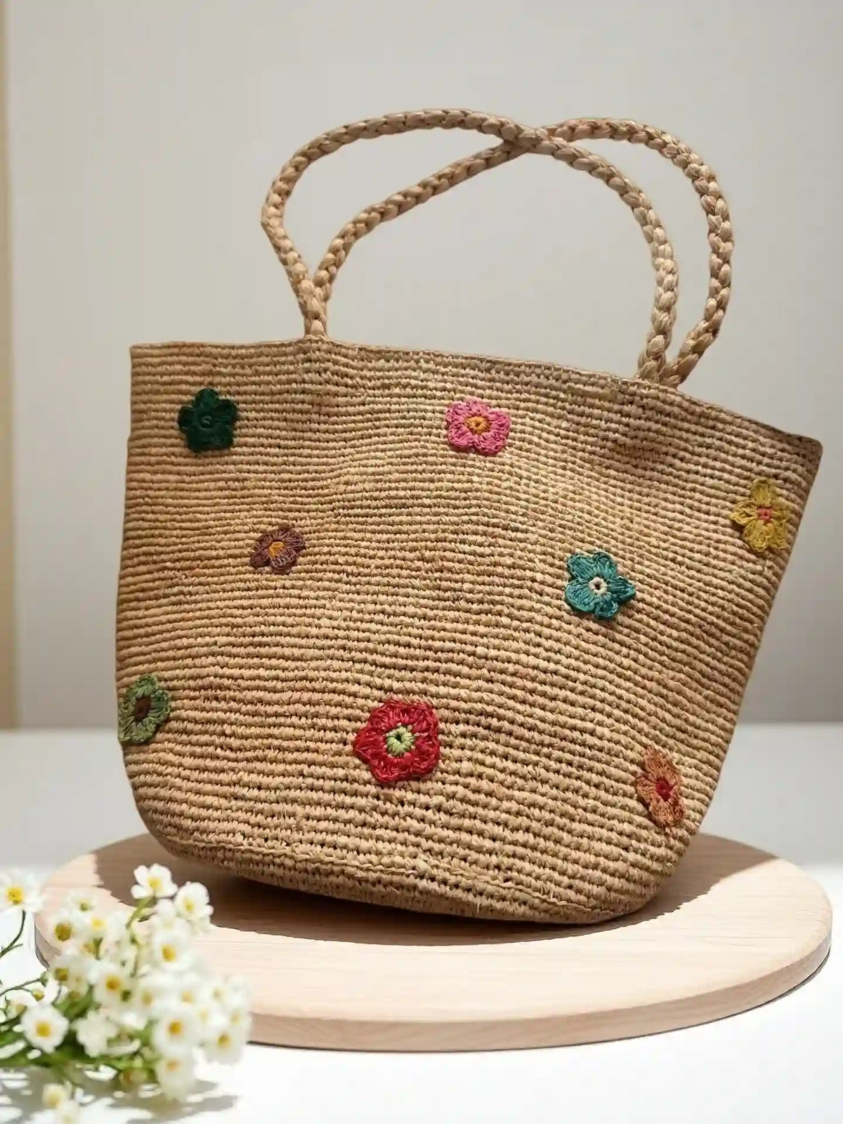 Handwoven straw tote bag with multicolor 3D crochet flower appliqués, large natural fiber basket handbag with braided handles for summer
