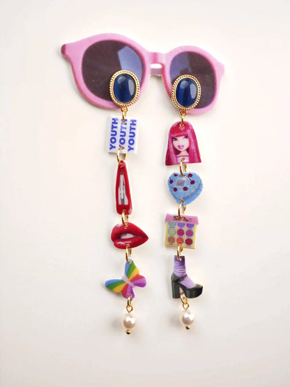 Y2K-inspired mismatched earrings with cherry-red hair clip and eyeshadow palette charms, pearl drop finish — hypoallergenic 925 sterling silver posts