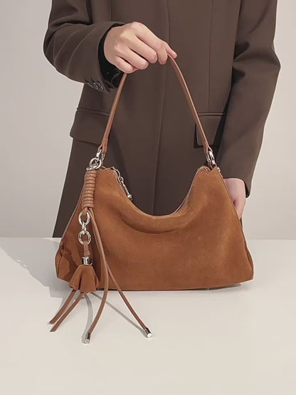 Lässige Hobo-Tasche aus Wildleder mit geflochtener Quaste