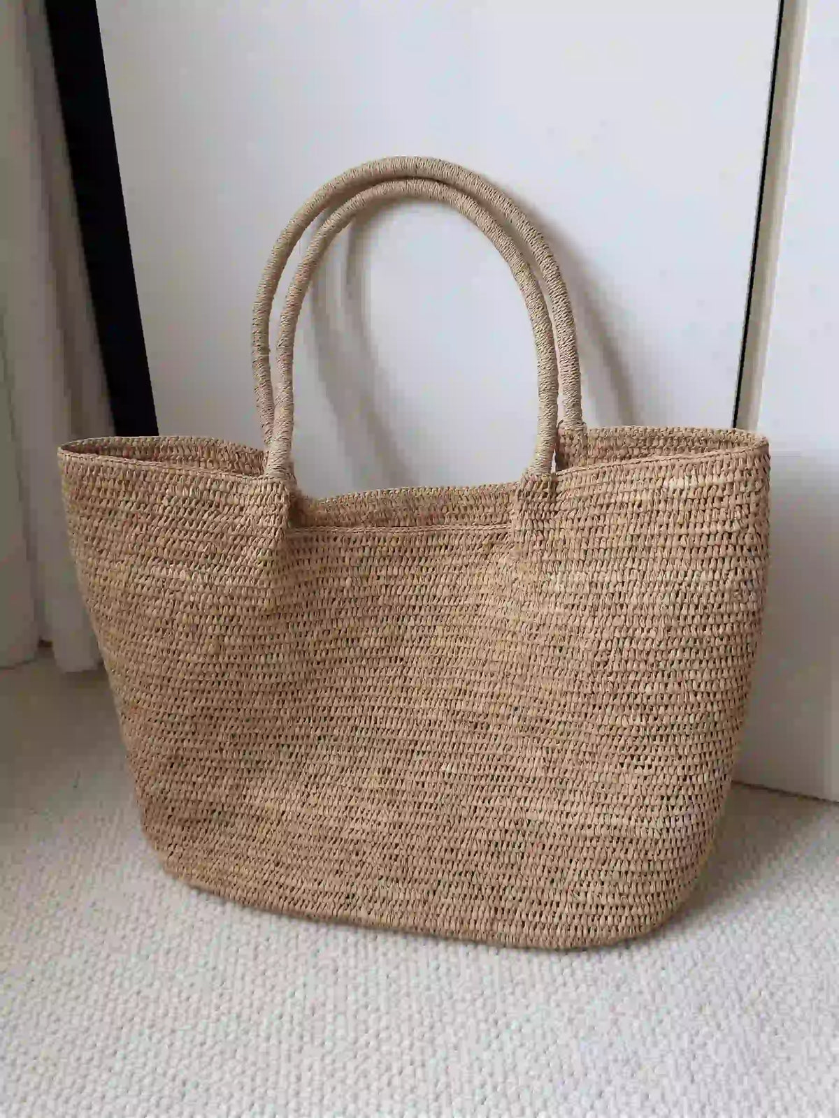 Sustainable raffia purse with open top and boho woven texture, quiet luxury summer accessories