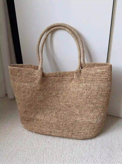 Sustainable raffia purse with open top and boho woven texture, quiet luxury summer accessories