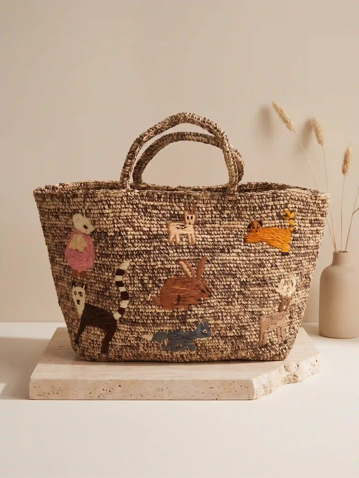 Large handwoven raffia tote bag with colorful embroidered animal patterns, artisan crochet basket bag with whimsical folk art design