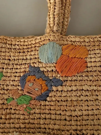 The Fiorella Embroidered Raffia Bucket Bag