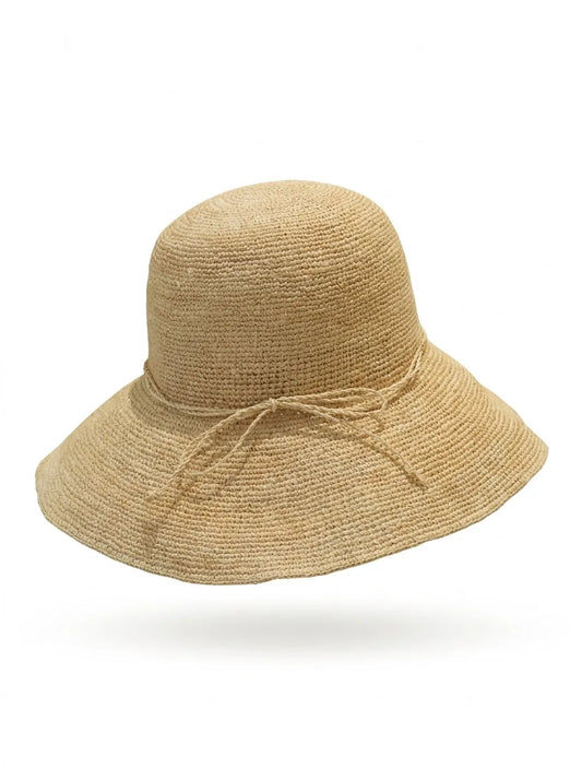 Natural beige handwoven raffia bucket hat with bow – artisan crochet wide brim sun hat – sustainable summer vacation accessory