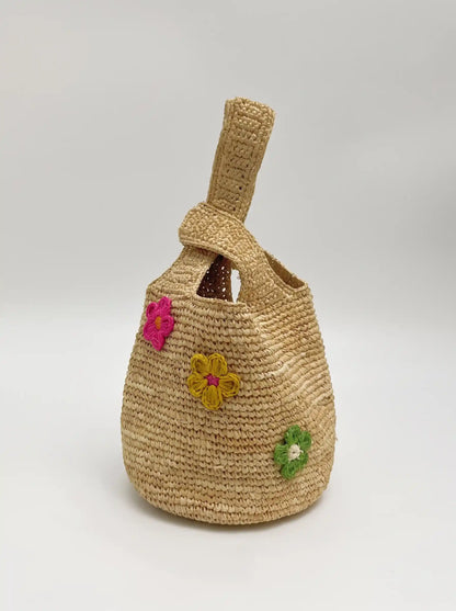 Raffia-Beuteltasche mit Blumenmuster