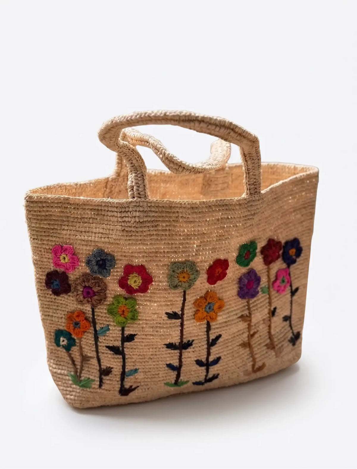 Handbestickte florale Basttasche